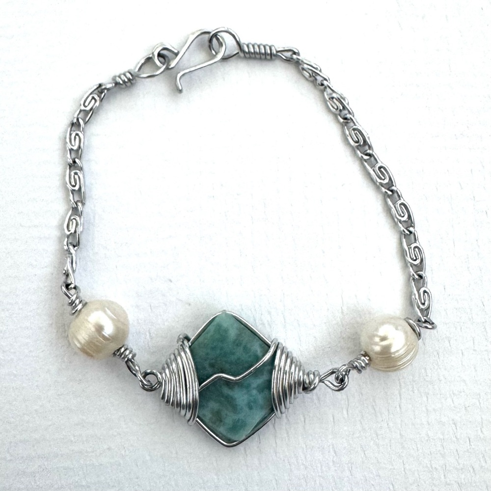 Bracelet. Silver Tone with Light Blue Stone Pendant. Handmade from South America